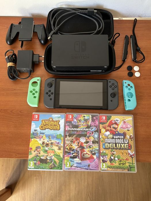 Bundle completo da Nintendo Switch, ideal para começar a jogar imediatamente com alguns dos melhores títulos da consola.