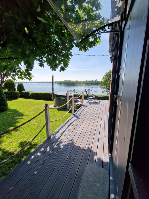 Domek nad jeziorem z własną linią brzegową jacuzzi  sauna  zwolnił się termin  PILNE 9.16/07/2026