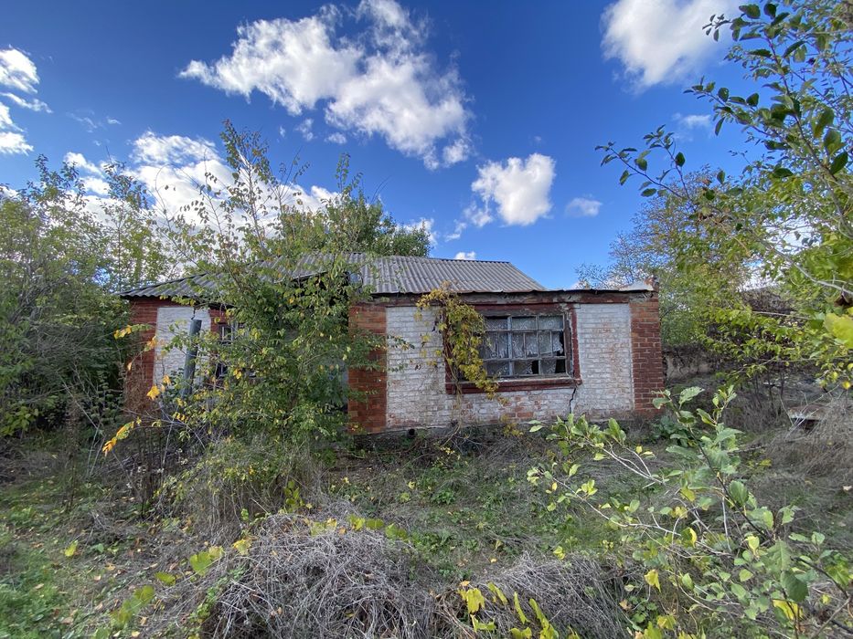 Ділянка з будинком по Халтуріна