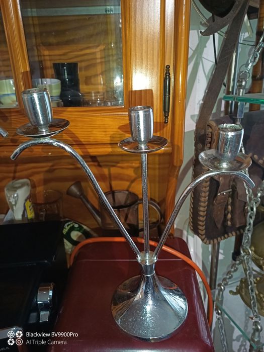 Par de castiçais de três velas cada um em latão