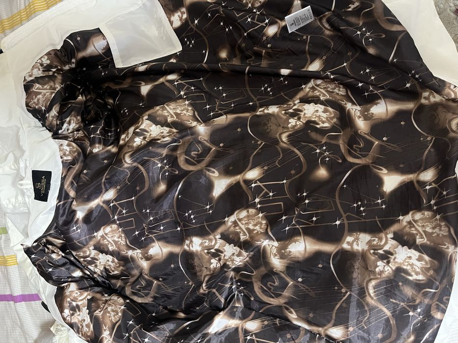 Продам белый пуховик