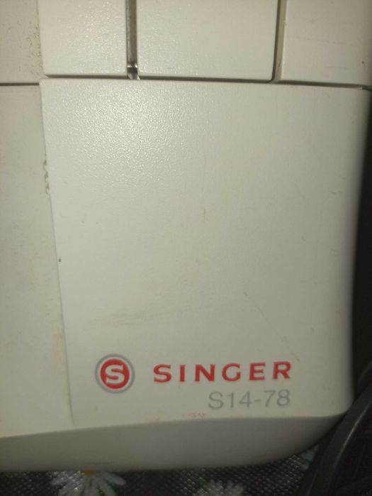 Продам оверлок singer