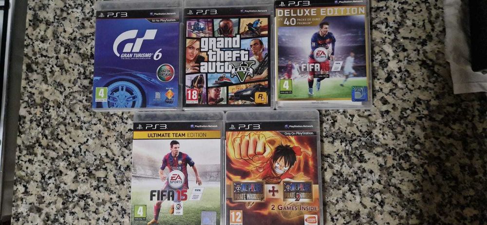 Consola PS3 Super Slim 500 GB + Comando original Sony + 4 jogos