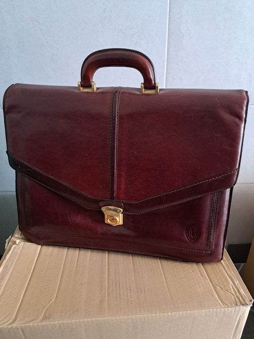 Mala de pele como nova