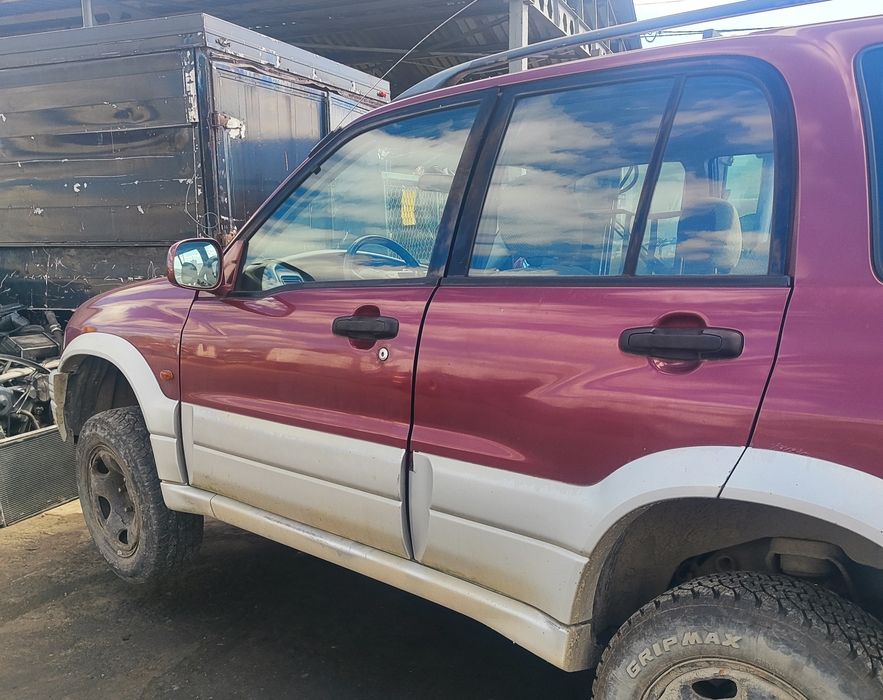 Suzuki grand Vitara drzwi lewy tył