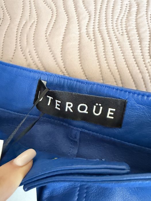Шкіряні нові брюки Uterque