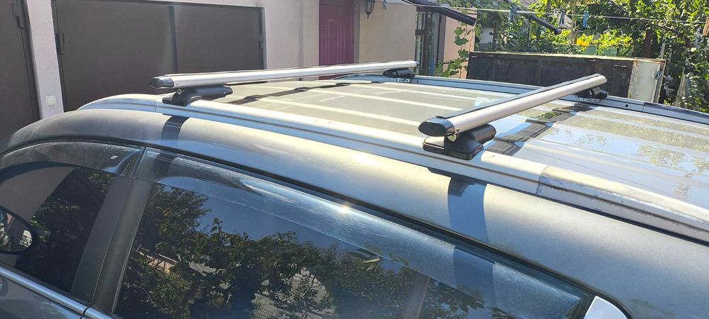 Аэродyги R4 на интегрированные рейлинги KIA Sportage 2010 - 2015г