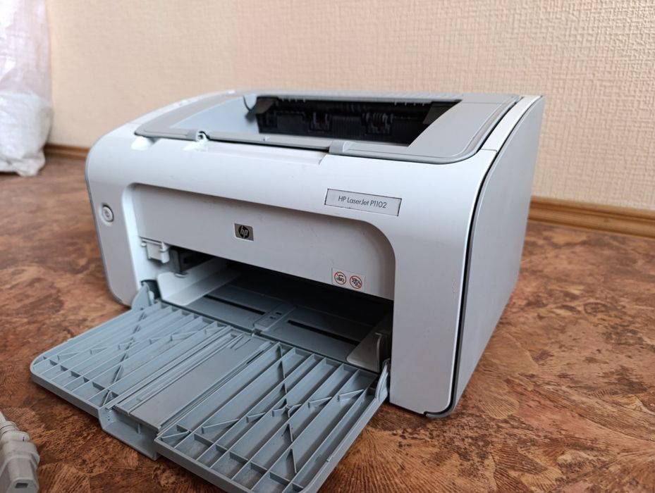 Принтер HP P1102