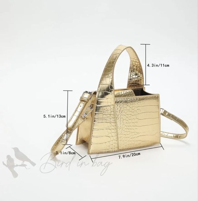 Жіноча золота сумочка