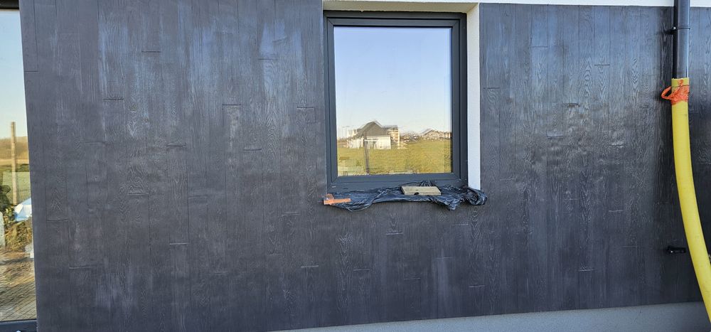 Domki jednorodzinne Klejenie styropianu, Tynk mozaikowy .