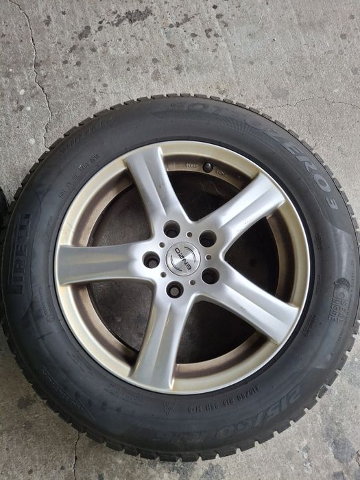 Opony zimowe z felgami 215/60 R16 komplet