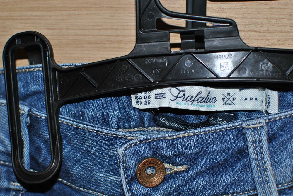 Zara spodnie jeansy z przetarciami 38 M