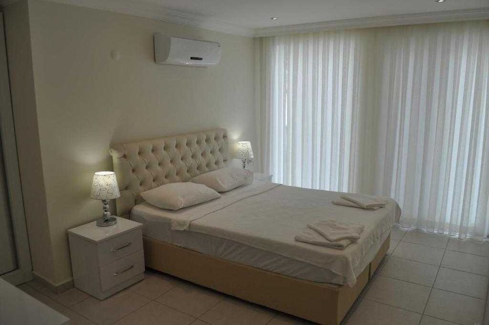 Аренда апартаментов 2+1, 90 м.кв. Личный сад с барбекю.Олюдениз,Турция