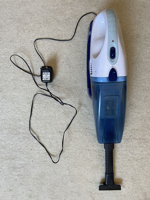 Aspirador portatil de parede.