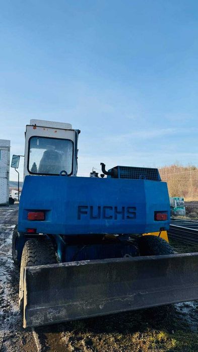 екскаватор, трактор Fuchs