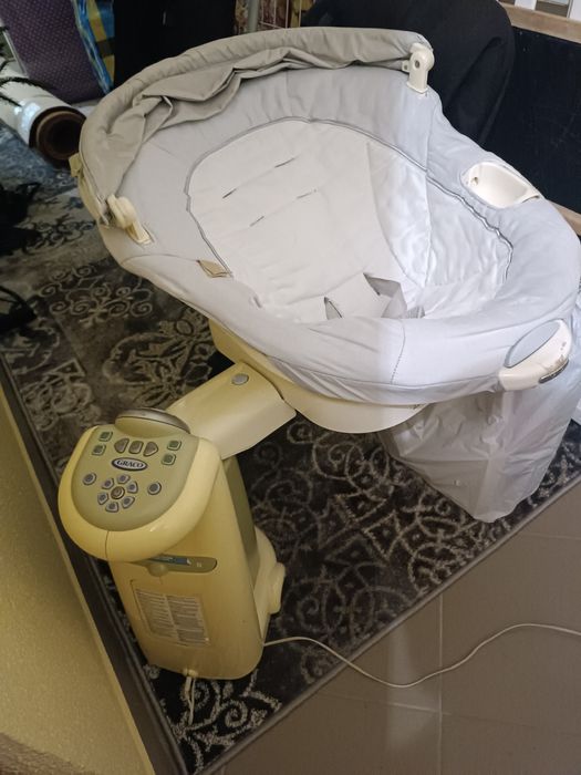 крісло колиска колисальний центр