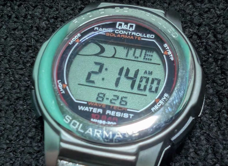 Часы QQ DP64 на солнечной батарее с радио,200 м рабочие . редкость.