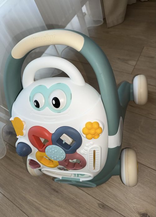 Дитячі  ходунки-каталку Smoby Little Smoby Trotty 3 в 1 у гарному стані.