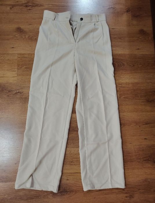 Брюки штани бежеві костюмка