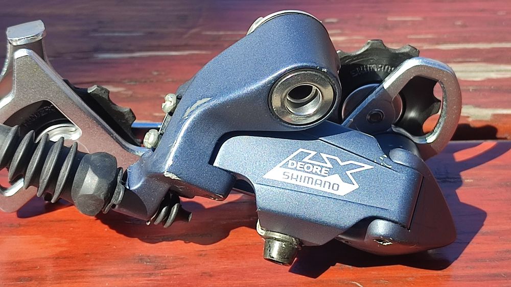 Przerzutka tył Shimano LX  RD-M570 , 9 s