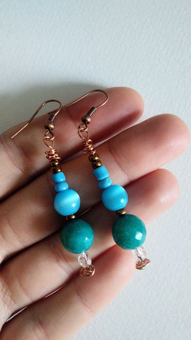 Brincos compridos azuis de inspiração étnica