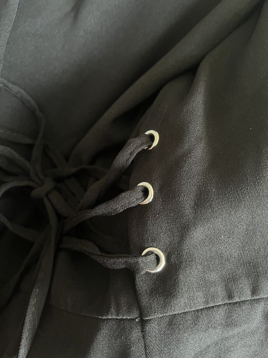 Czarny kombinezon reserved