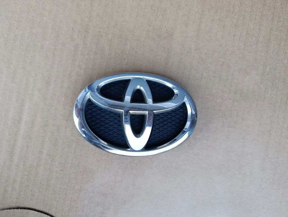TOYOTA YARIS II 2 EMBLEMAT ZNACZEK CHROM PRZÓD 75311-0D030