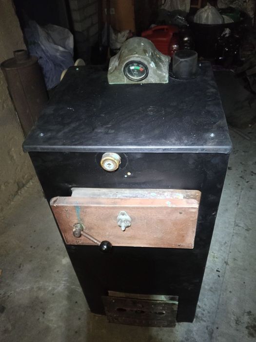 Продам Котел твердопаливний