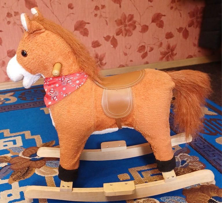 Коник гойдалка музикальний