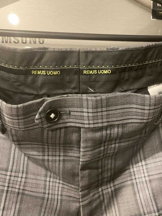 REMUS UOMO nowe eleganckie spodnie męskie 70% wełna