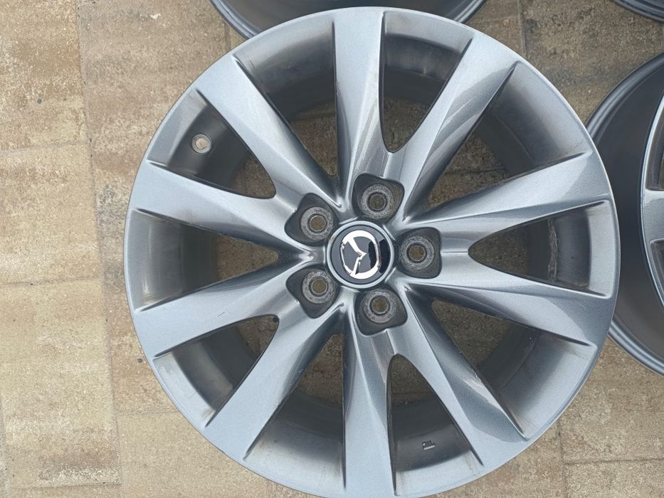 Oryginalne felgi aluminiowe Mazda, R17 5x114.3, ET 50, dekielki