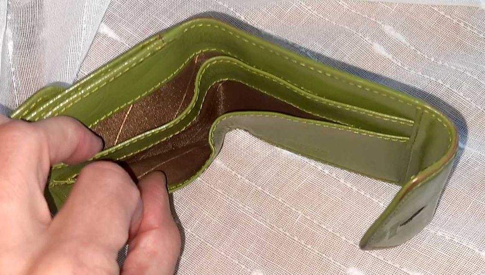 Б/у женский кожаный кошелек Puccini 9х9 см