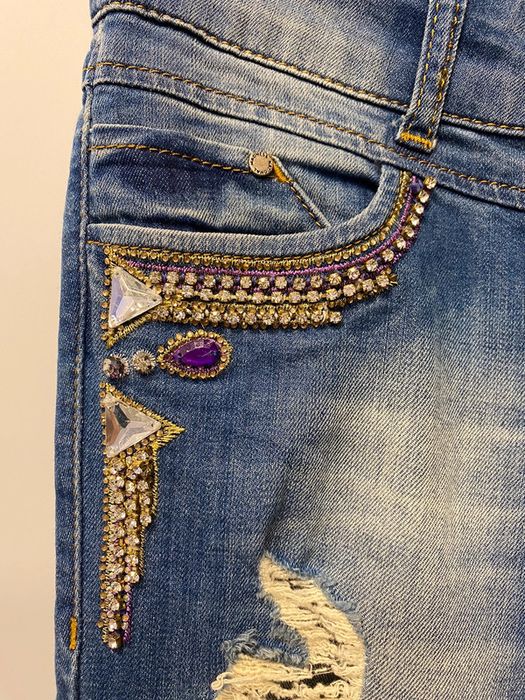 AMN jeansy slim fit swarovski kamienie zamki rurki z dziurami vintage