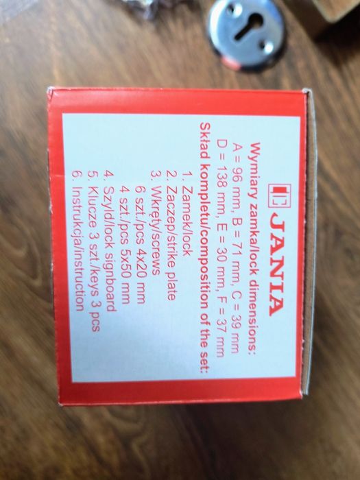 Zamek nawierzchniowy Jania do drzwi sprawny