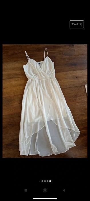 Elegancka biała midi sukienka