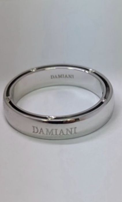 Обручка Даміанібіле золото із діамантами.