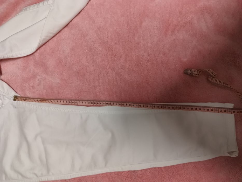 Białe spodnie 3/4 Clockhouse 40