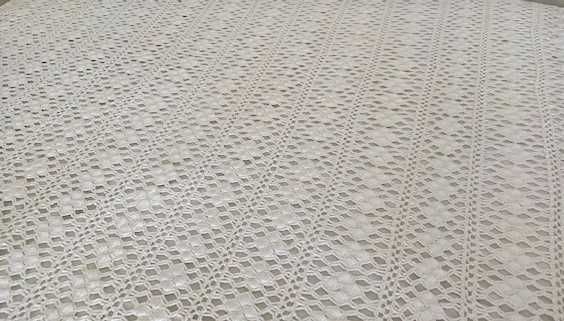 Colcha de renda feita à mão