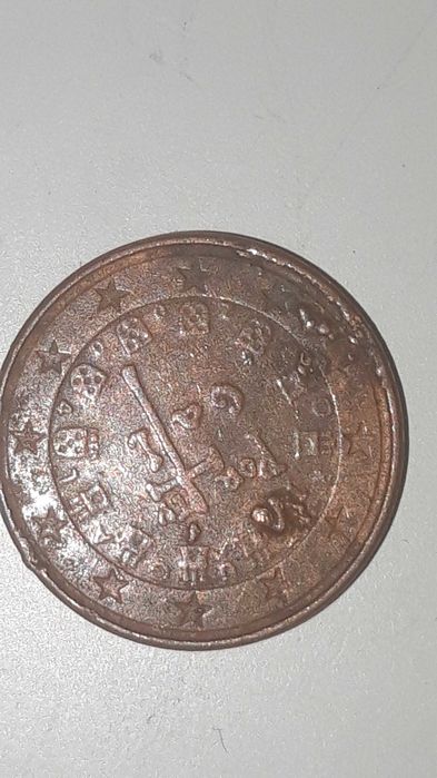 3 moedas de 1 centimo com defeito.