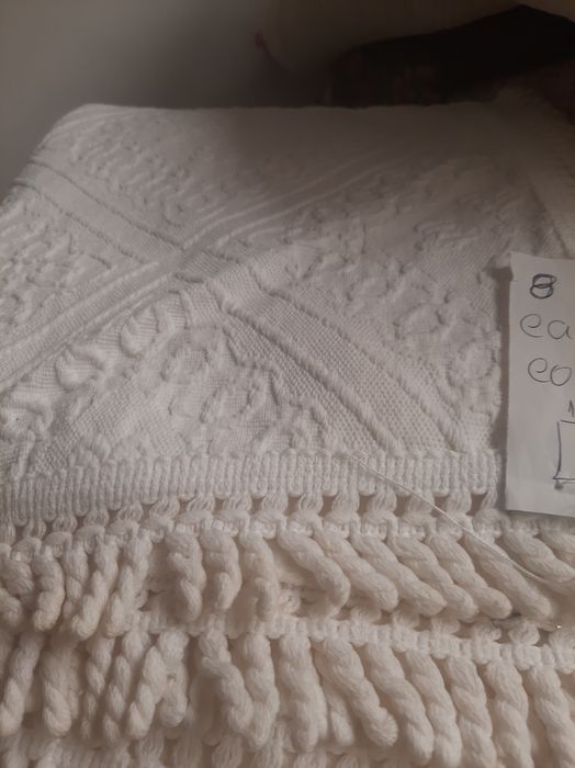 Várias colchas , cores diferentes