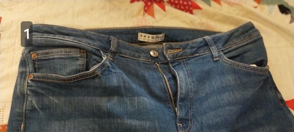 Calça ganga escura rasgada shein