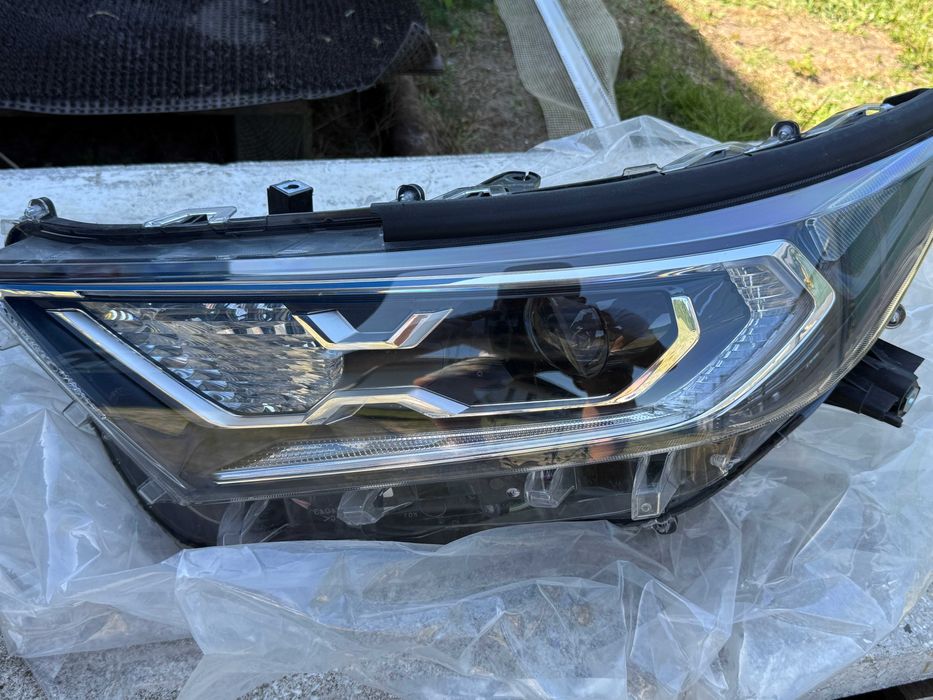 Lampa lewy przód Toyota RAV4 OE  LIFT