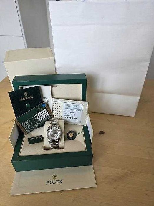 Rolex Oyster Datejust Roulette 36 mm ref: 126200