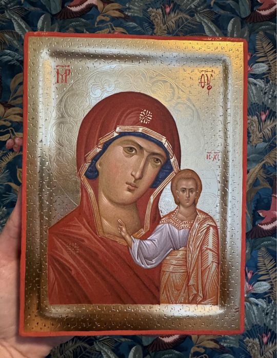 Three handmade icons on gold background. Jesus Christ, Madonna, archangel Michael.