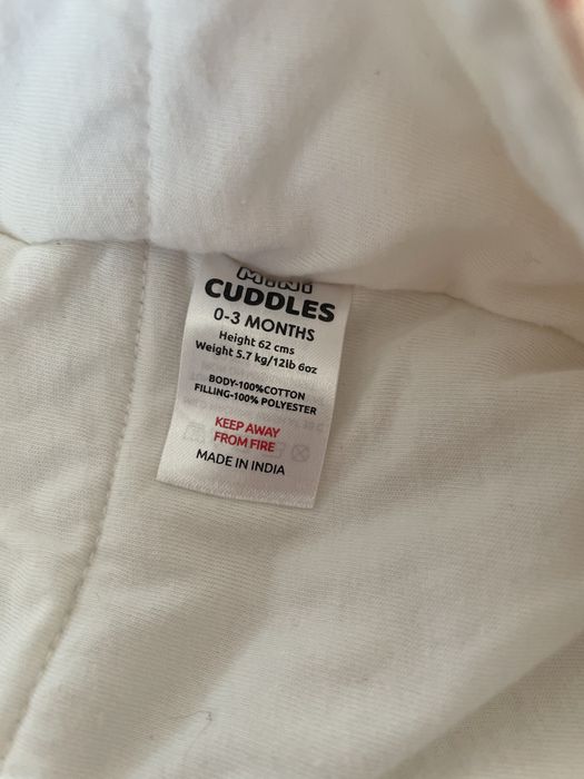 Kombinezon w serduszka dla dziewczynki