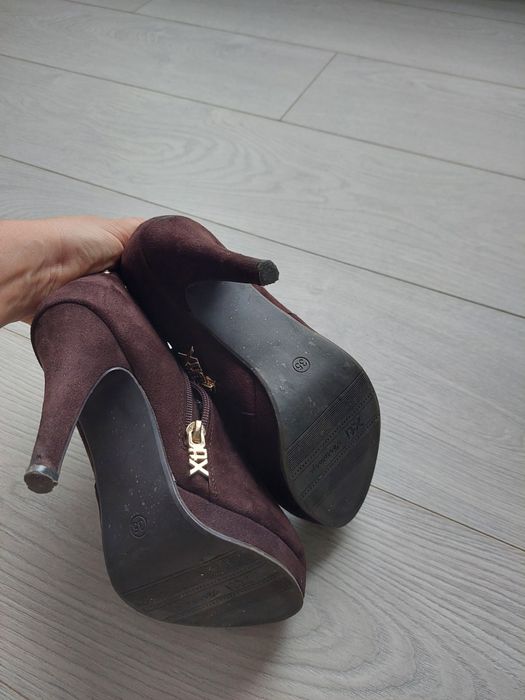Botins marca Xti