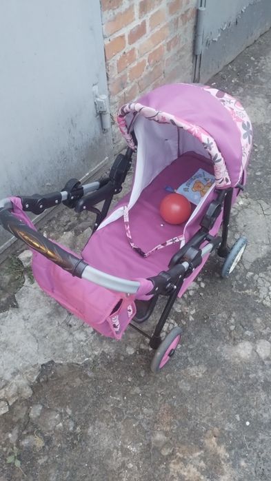 Дитяча іграшкова коляска