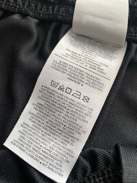 NIKE r.L oryginalne spodnie sportowe stan BDB