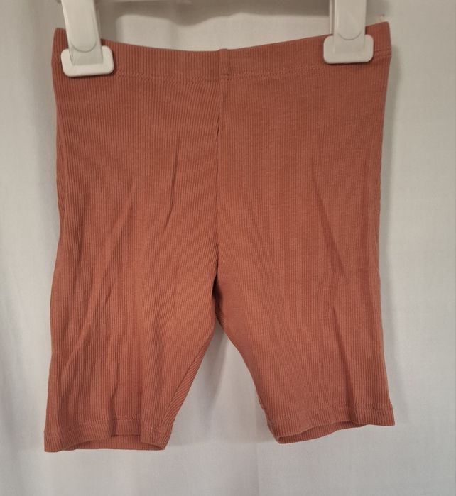 H&M ceglaste prążkowane kolarki legginsy r. 116