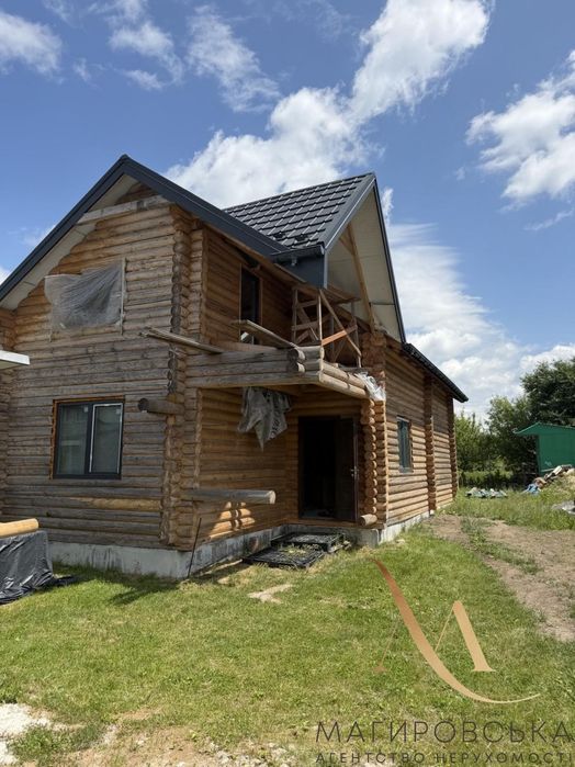 Продаж будинку зі зруба на ділянці під інд. будівництво по вул. Надійна